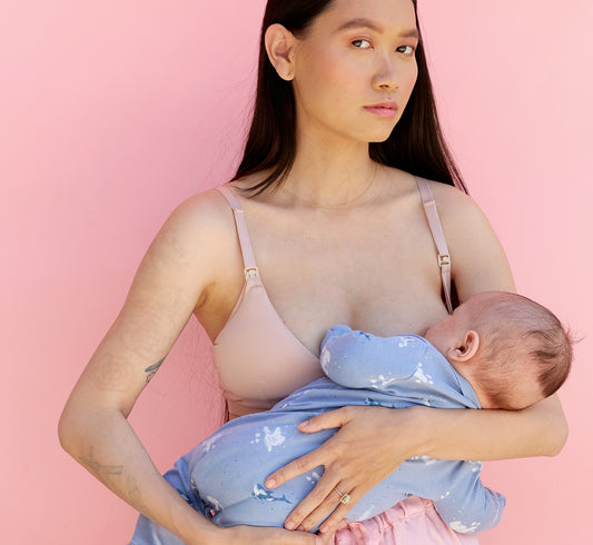 Woman breastfeeding in Pepper's Nursing Bra for small boobs (sizes AA-B)