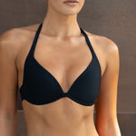 Black plunge bikini top with halter straps and ribbed texture.