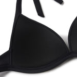 Black plunge bikini top with ribbed straps and textured fabric cup detail.
